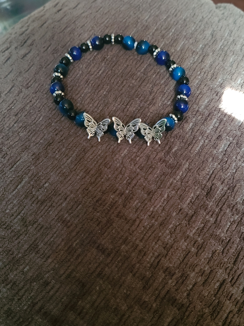 Blue Beaded Stretch Bracelet with Butterfly Charms